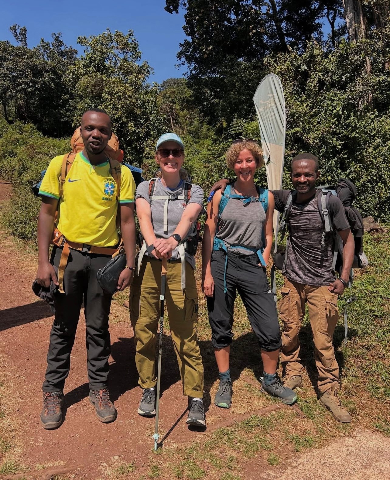 Travelers and guides on a Kilimanjaro hike